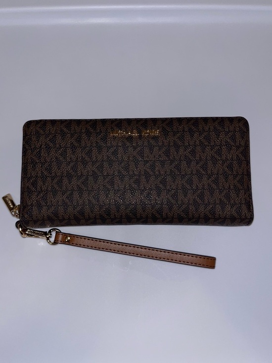 Michael Kors Handbags - Michael Kors Brown Monogram Zip Wristlet with Gold Hardware